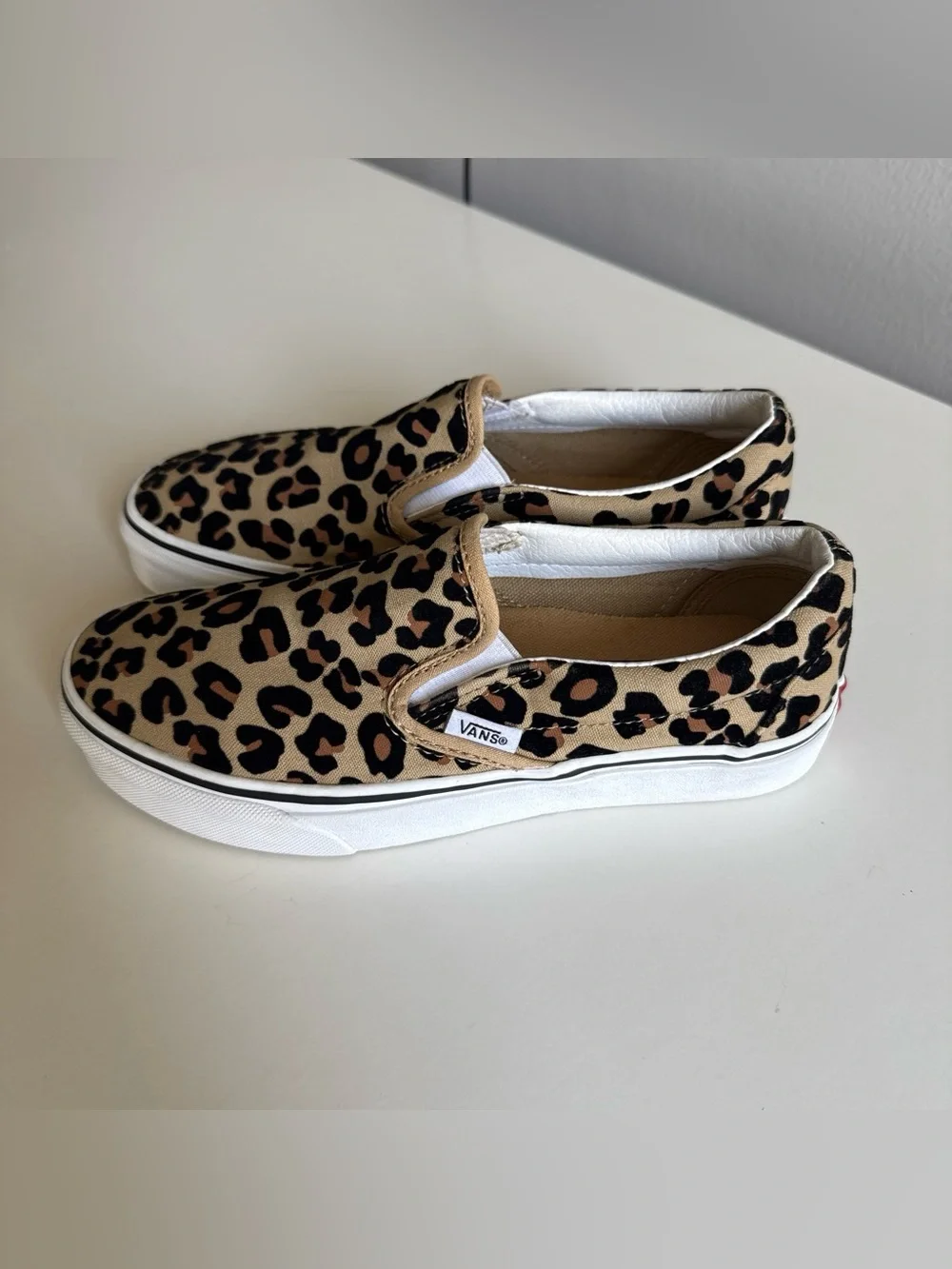 Vans Kids Leopard Print Slip-On Sneakers in Tan and Black